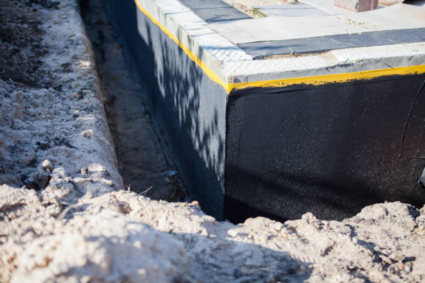 Professional Waterproofing technician working in Baldwin, PA